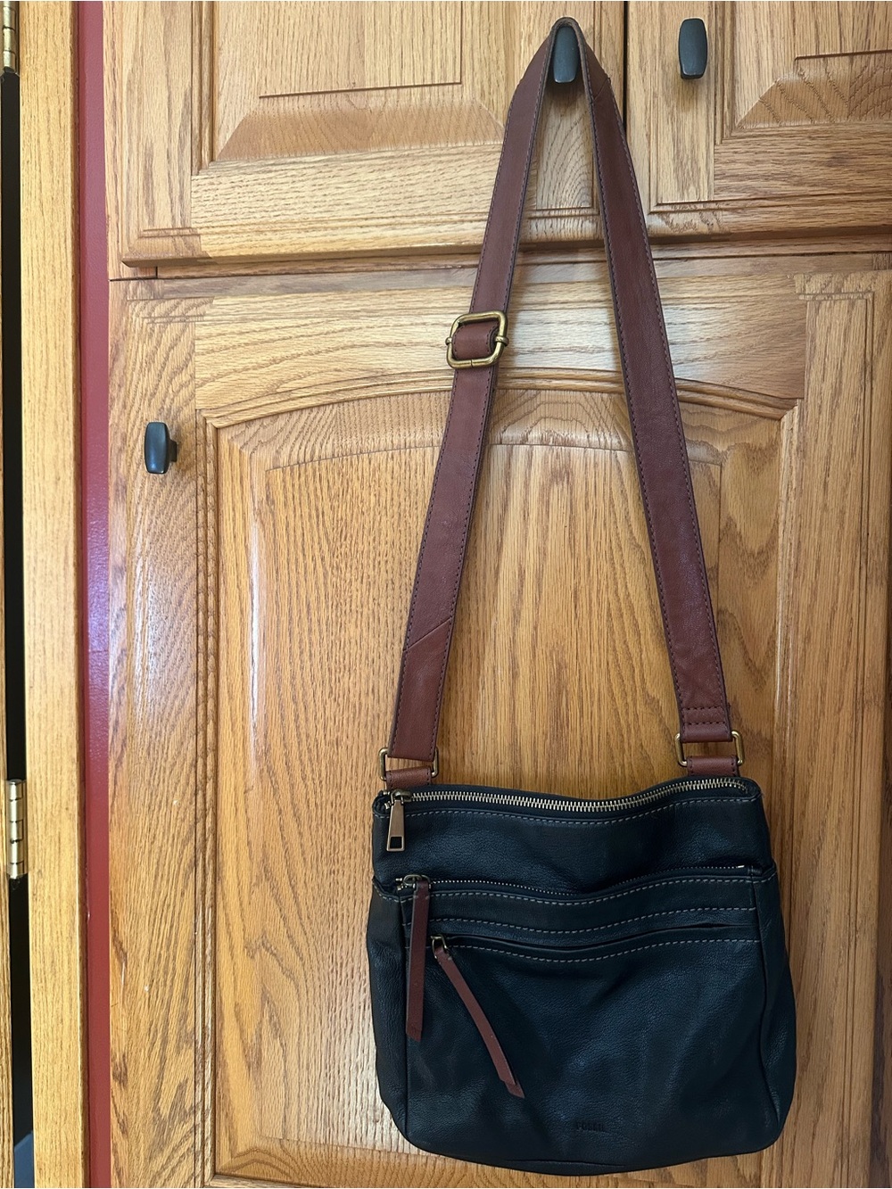 Black Fossil Crossbody Bag with Brown Strap